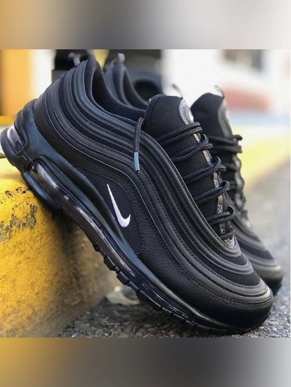 Nike Men’s Black Sneakers with White Swoosh